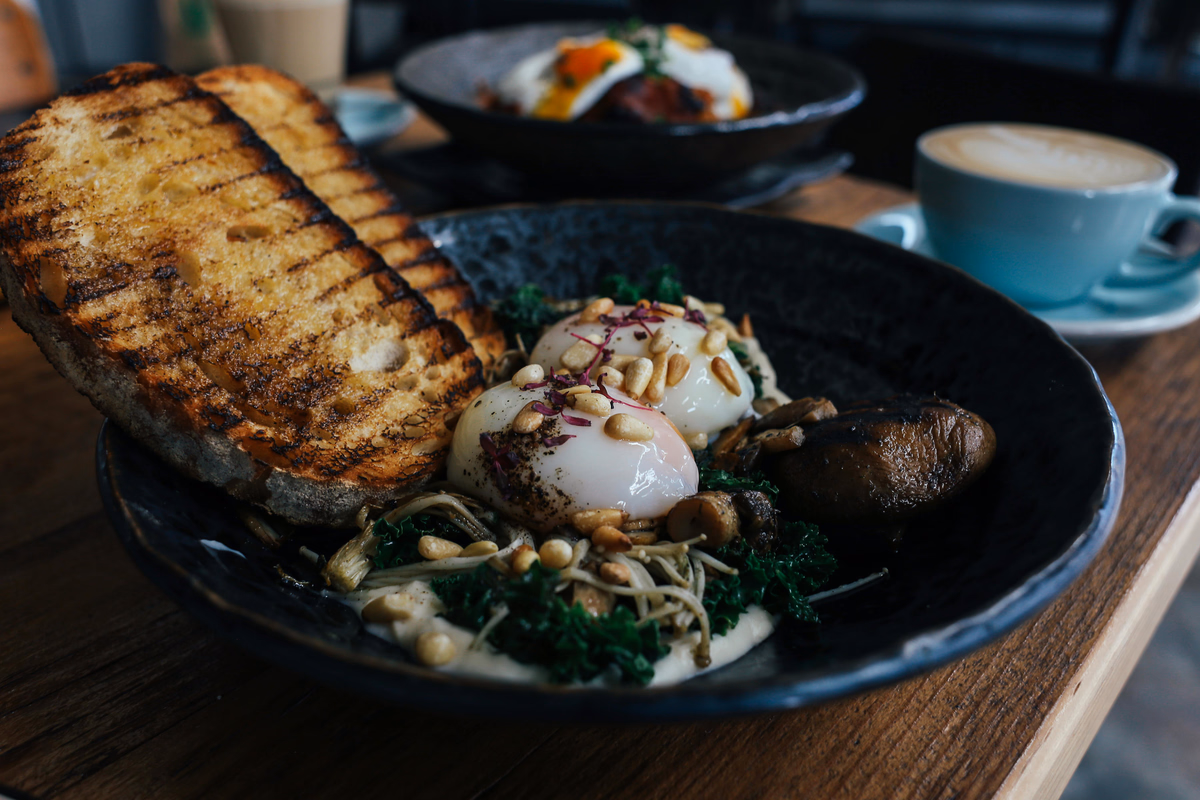 Poached Eggs Over Collard Greens & Shiitake Mushrooms
